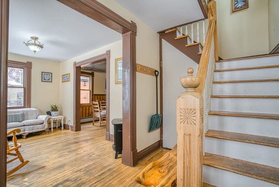 【Spiral Staircase】 Original Victorian spiral — the signature feature of The Rosemont.