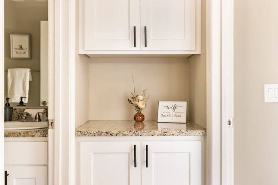 The nook in the entry to drop your purse or keys.