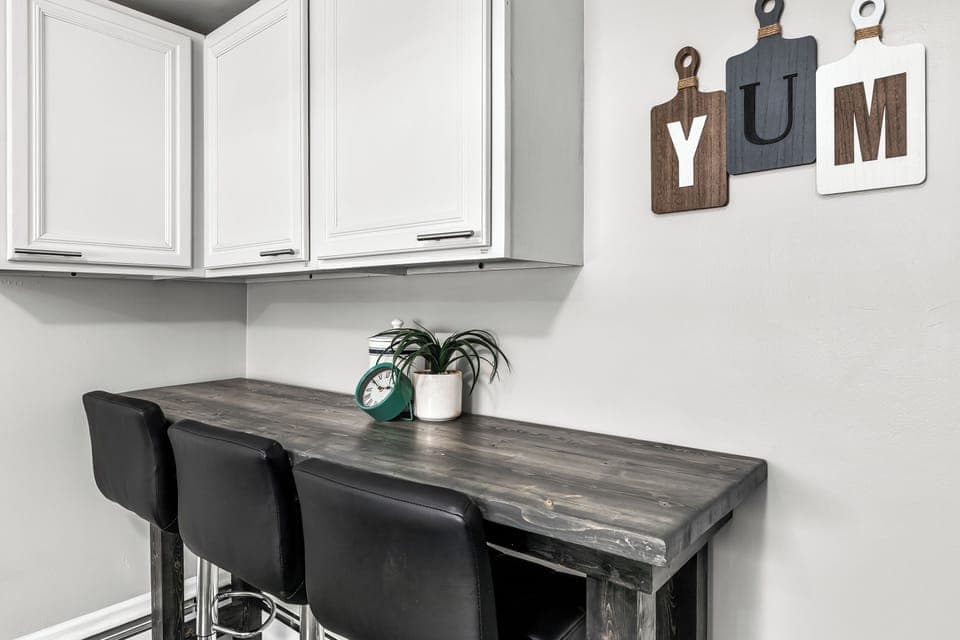 Seating for 3 at the breakfast nook as well as additional storage for food