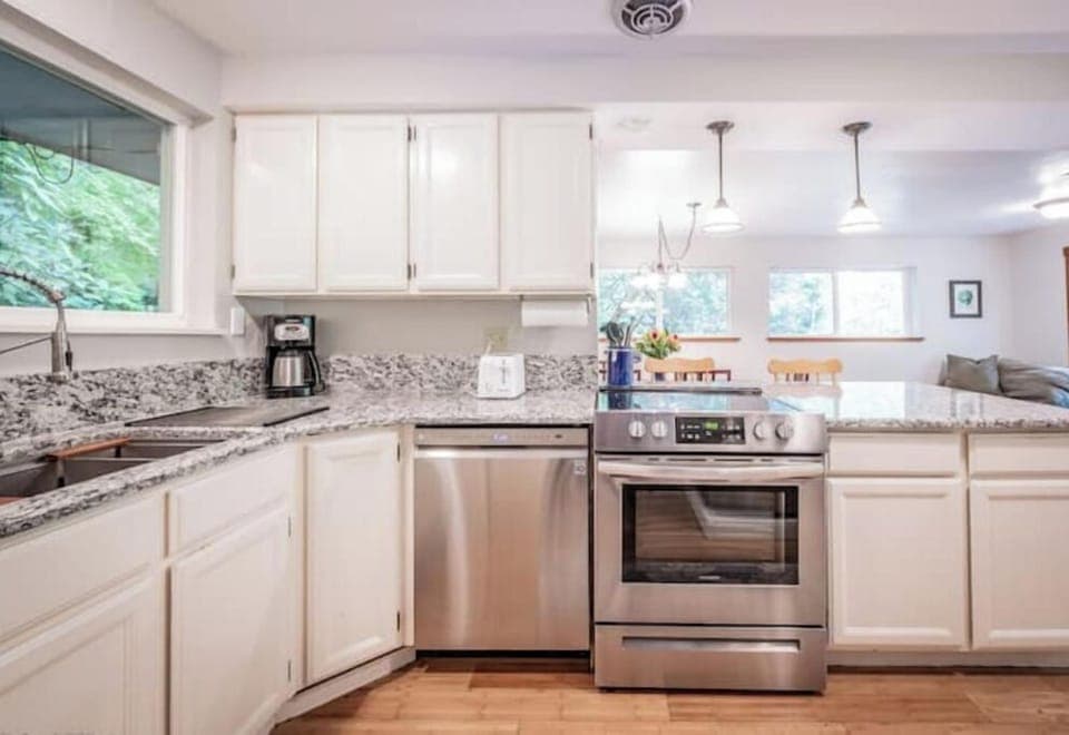 Fully stocked kitchen includes extras like spices, wine glasses, pizza cutter...