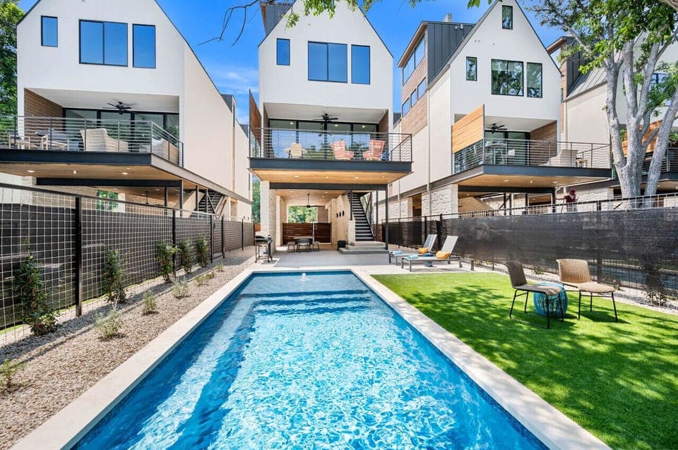 Porter Haus at Camp Warnecke-Heated pool with outdoor seating and Comal River views