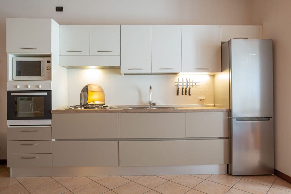 Comfort Apartment | Private kitchen | Full-size fridge, microwave, oven, stovetop