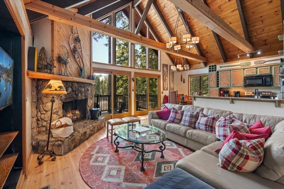 Open living area with TV, wrap around deck and VIEWS!!!