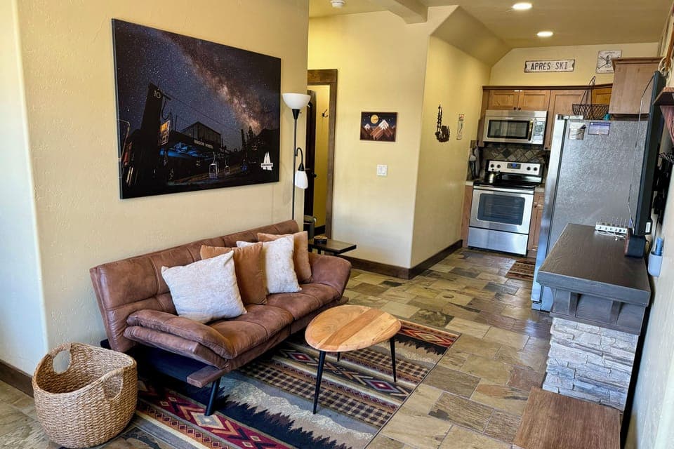 Living Area views into Kitchen