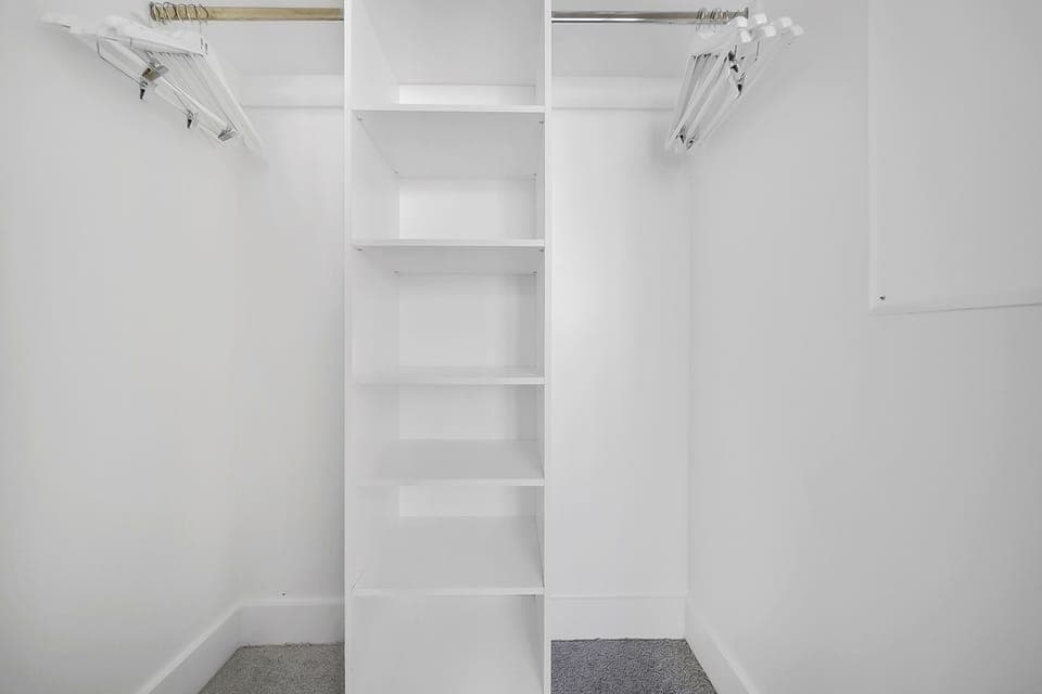 The spacious walk-in closet will accomodate all your belongings.