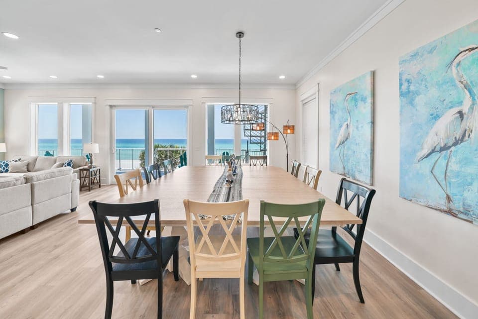 Gather around your spacious dining table with stunning ocean views, where every meal becomes a celebration with the sea as your backdrop.