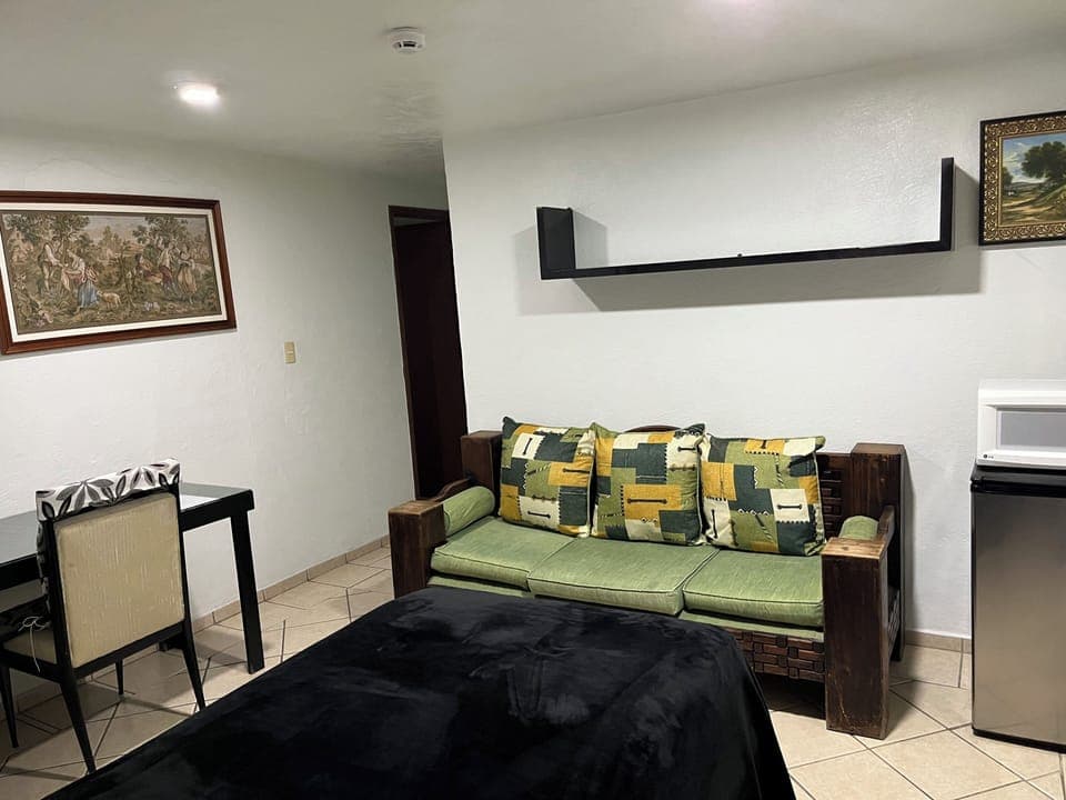 Standard Double Room, 1 King Bed, Refrigerator & Microwave, Courtyard View | Living area | Netflix, streaming services