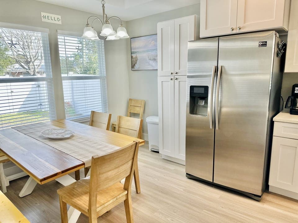 Dining table with seating for shared meals and family gatherings.