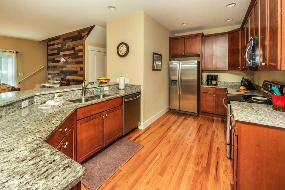 The kitchen has all stainless steel appliances, granite and is well stocked.