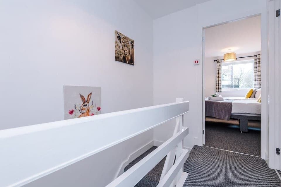 The upstairs landing leads to the 3 bedrooms and bathroom.