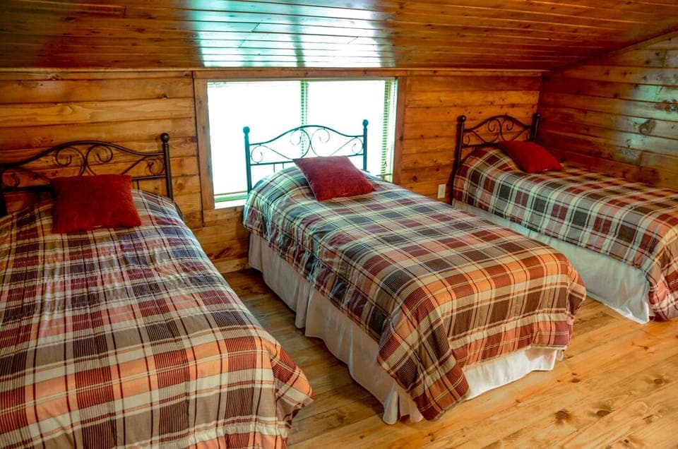 Bedroom #4 with three twin beds