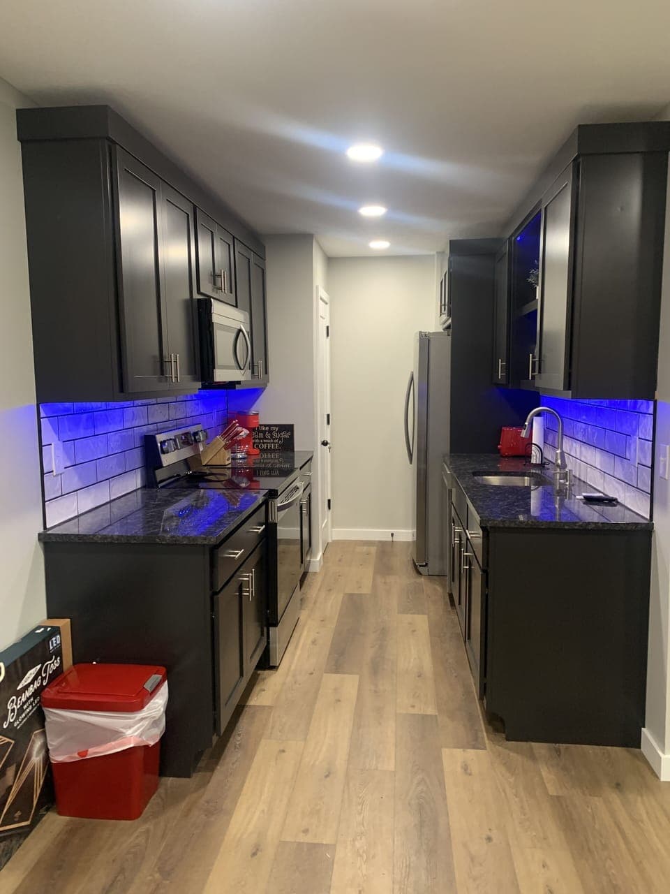 Fully stocked kitchen with granite ctops, LED cabinet lights,stainless appliance