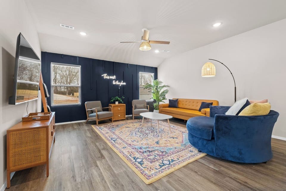 Open concept living room with cozy accommodations! 