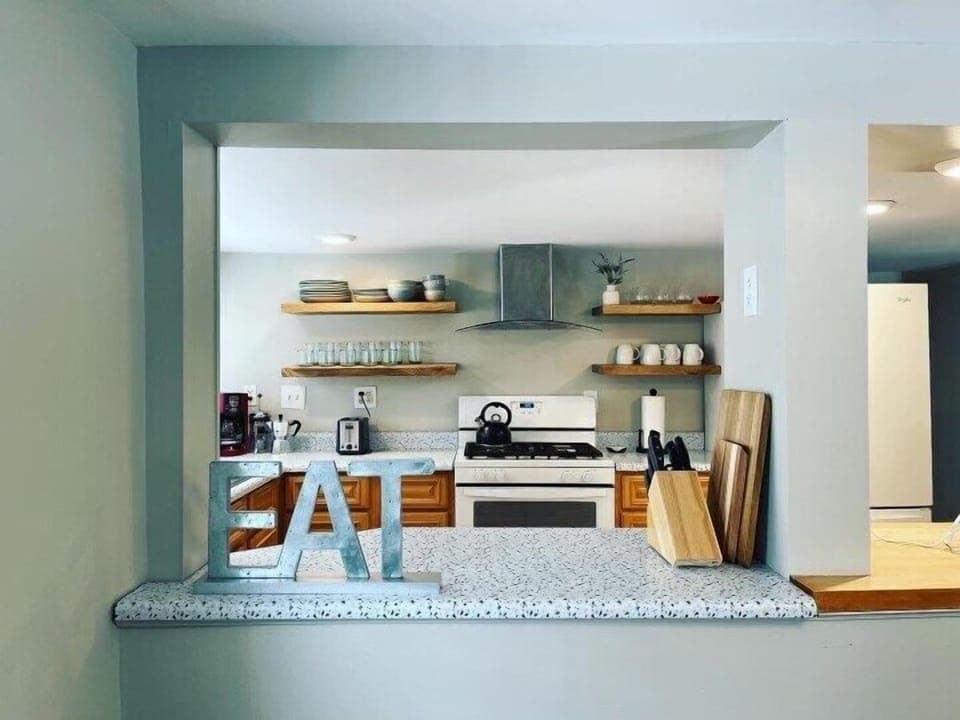 Step into this charming, fully equipped kitchen, stocked with everything you need to cook, cip, and savor throughout you stay.  
