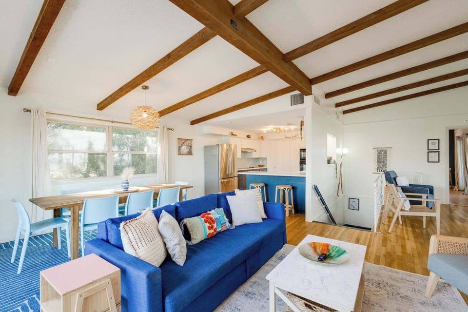 Upstairs living area, dining area, off kitchen with serving bar. 180 degree lake views and easy access to all the entertainment deck spaces!