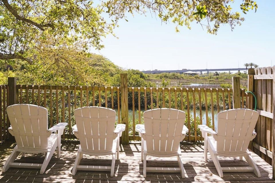 Extend your living space with inviting outdoor seating: a perfect spot to enjoy fresh air and relaxation in your stylish retreat