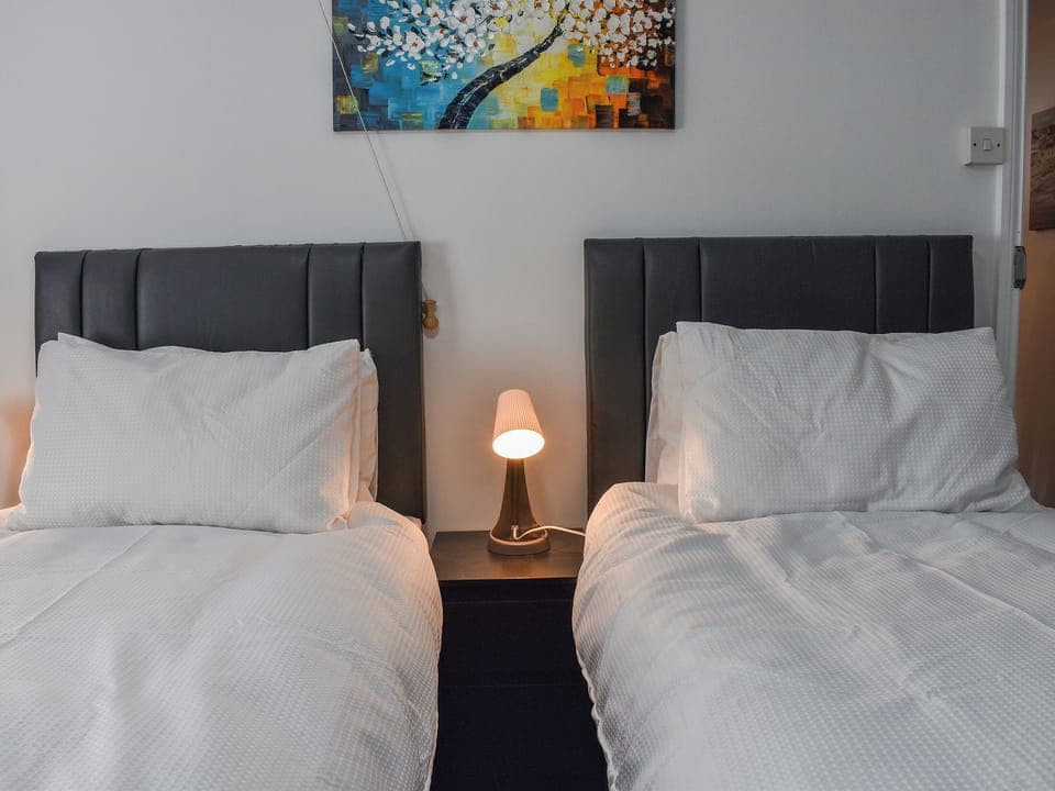 Twin bedroom | The Old Post House, Street