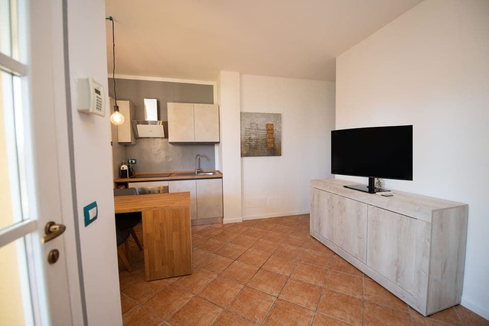 Family Apartment | Living area | 30-inch TV with digital channels