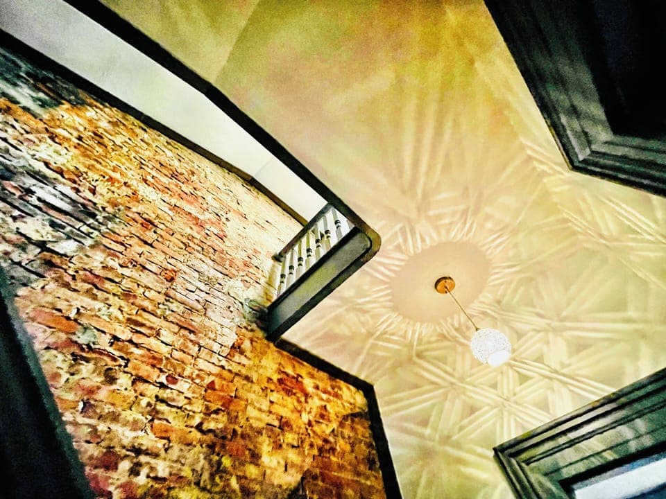 The architecture of the house is rich with charm and character.