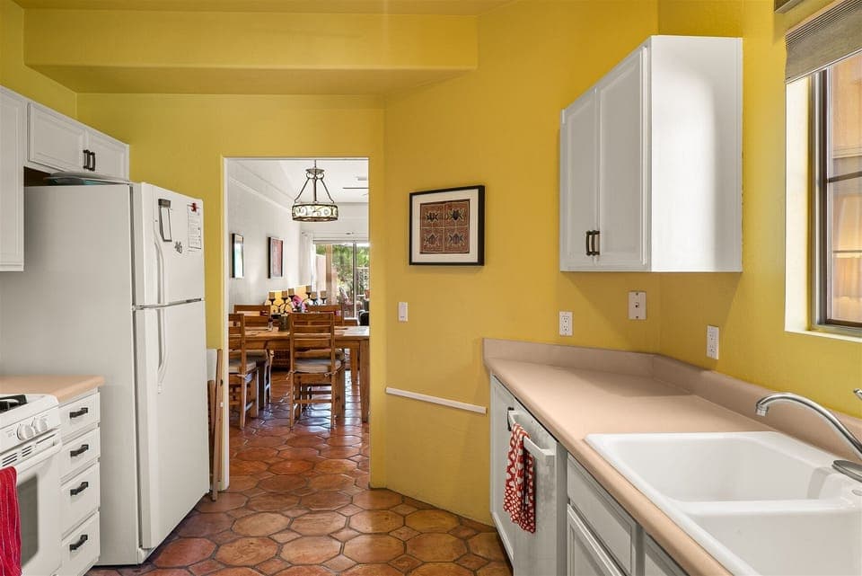 The kitchen is clean and well-equipped