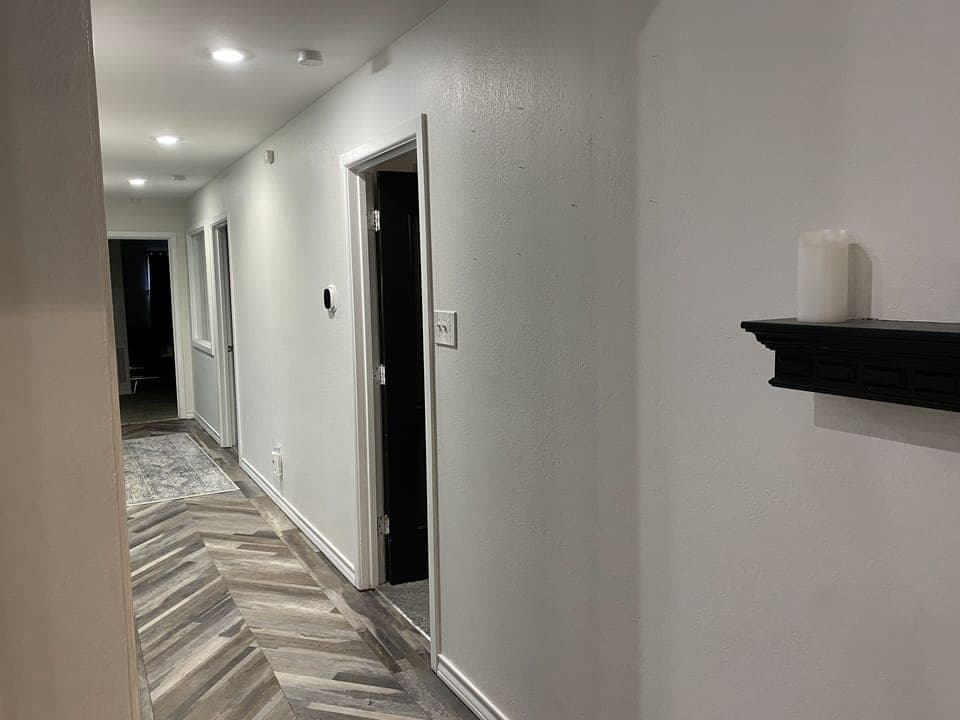 Hallway to Bunk Room, Queen Room, Game Room and Pool Area