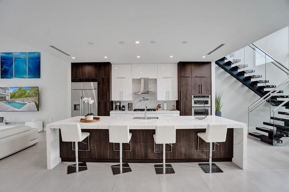 Gourmet kitchen with modern appliances, breakfast bar, and all the supplies you need for a great stay.