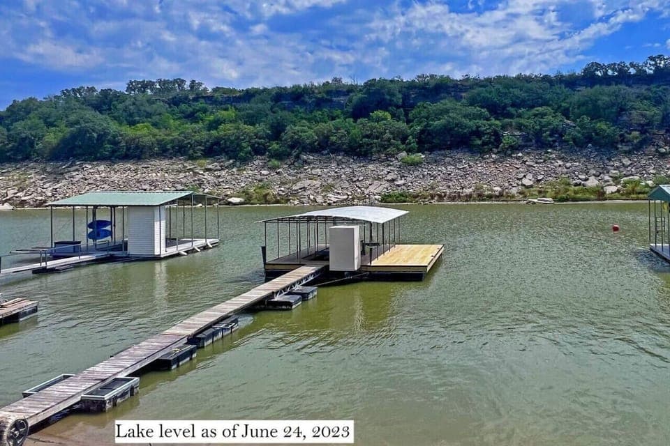 Dock days are the best days—private lakefront dock on Lake Travis (lake has risen since!) for fishing, floating, and sunset views in Spicewood.