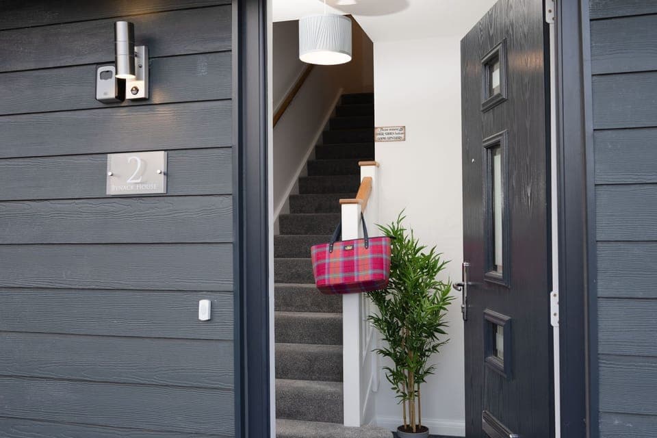 No2 Bynack House front door and handbag