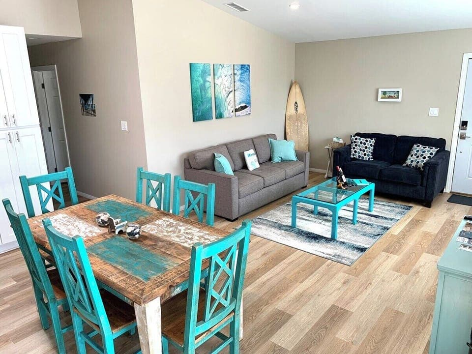 Front: Colorful living room and kitchen area