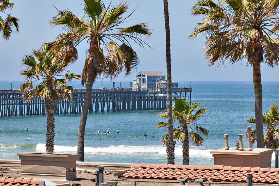 pier and ocean views from living, kitchen/dining, balcony