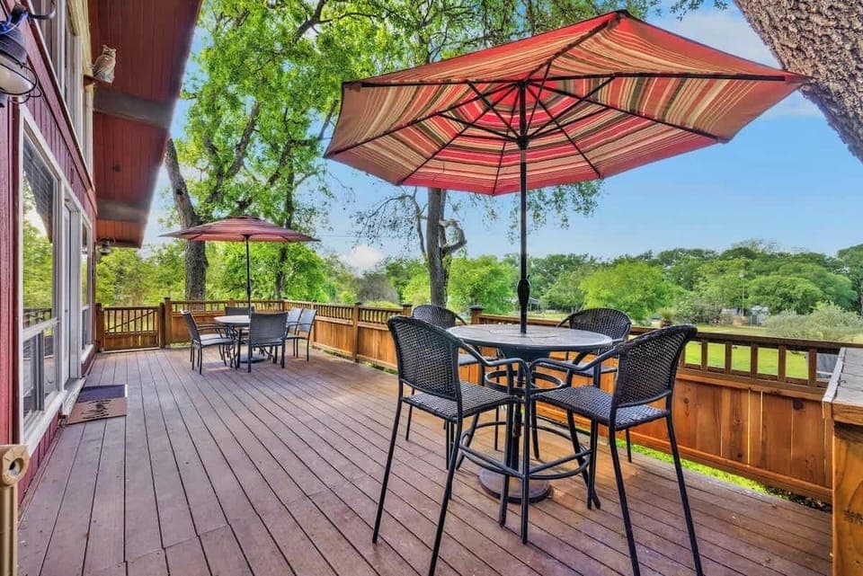 Relax on the spacious deck with shaded seating and tables.