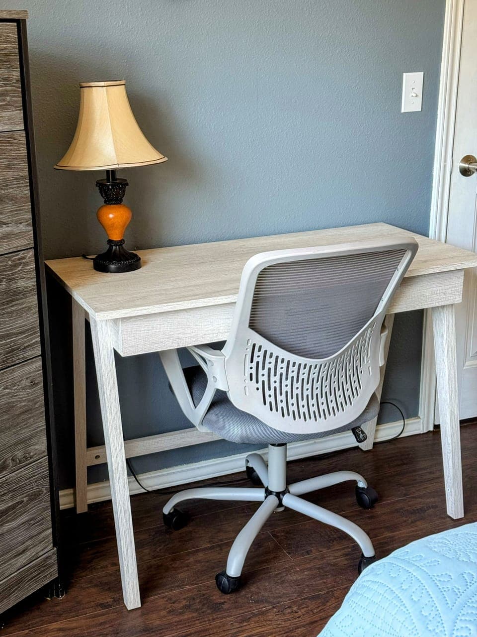 Desk in front bedroom with office chair. Perfect work space.