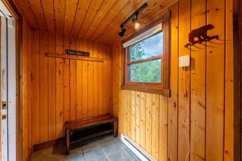 Mudroom entrance off the driveway is the perfect drop zone for your winter or summer gear.