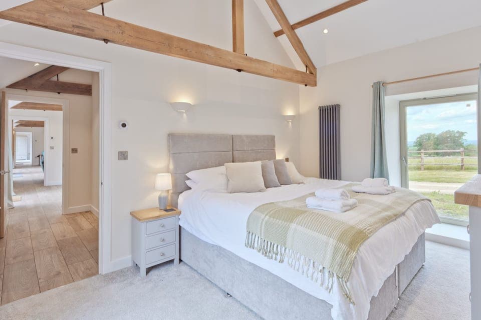 Twin beds that can be zipped together to make a super king, TV in room