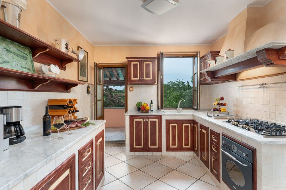 Villa | Private kitchen | Full-size fridge, microwave, oven, stovetop