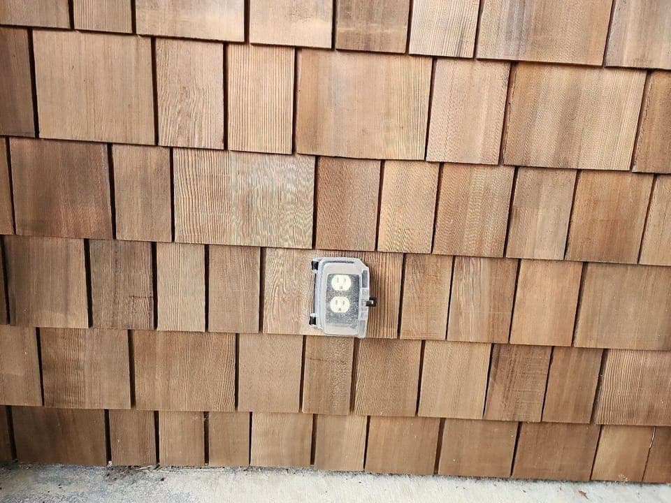 110V outlet for EVs (no extension cord provided)