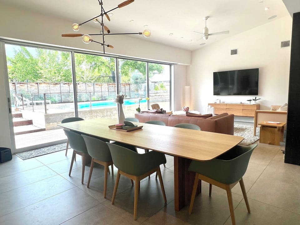 Dining room with sitting up to 8 people. This area has a 4 panel slider.