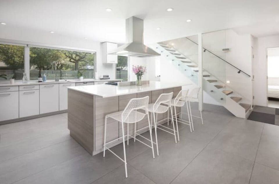 Kitchen with gorgeous white granite countertop and state of the art appliances!