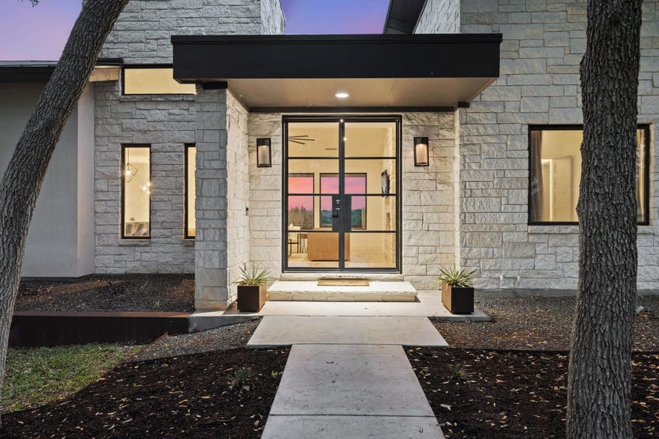 Modern Hill Country entryway with warm, inviting charm.