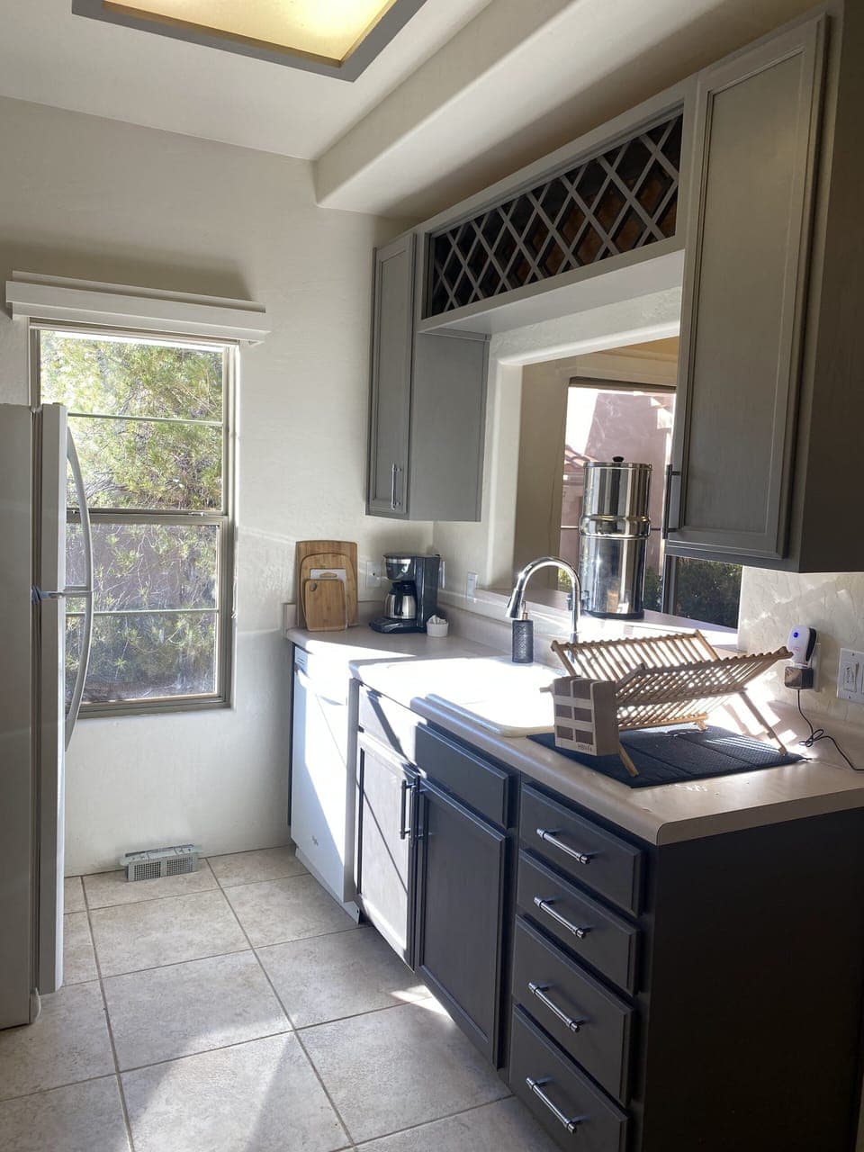 Adorable Galley Kitchen in shades of modern gray.