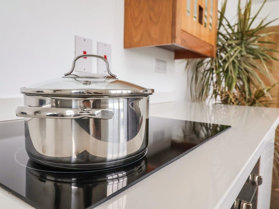 Fridge, dishwasher, electric kettle, cookware/dishes/utensils