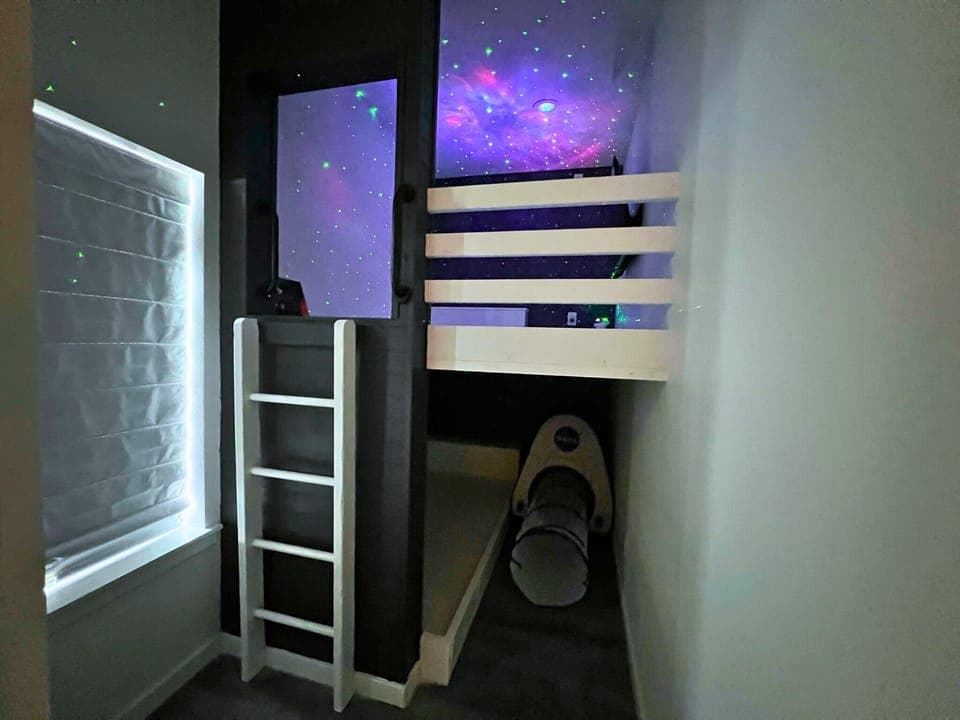 Kids will blast off into fun in this galaxy-inspired room.