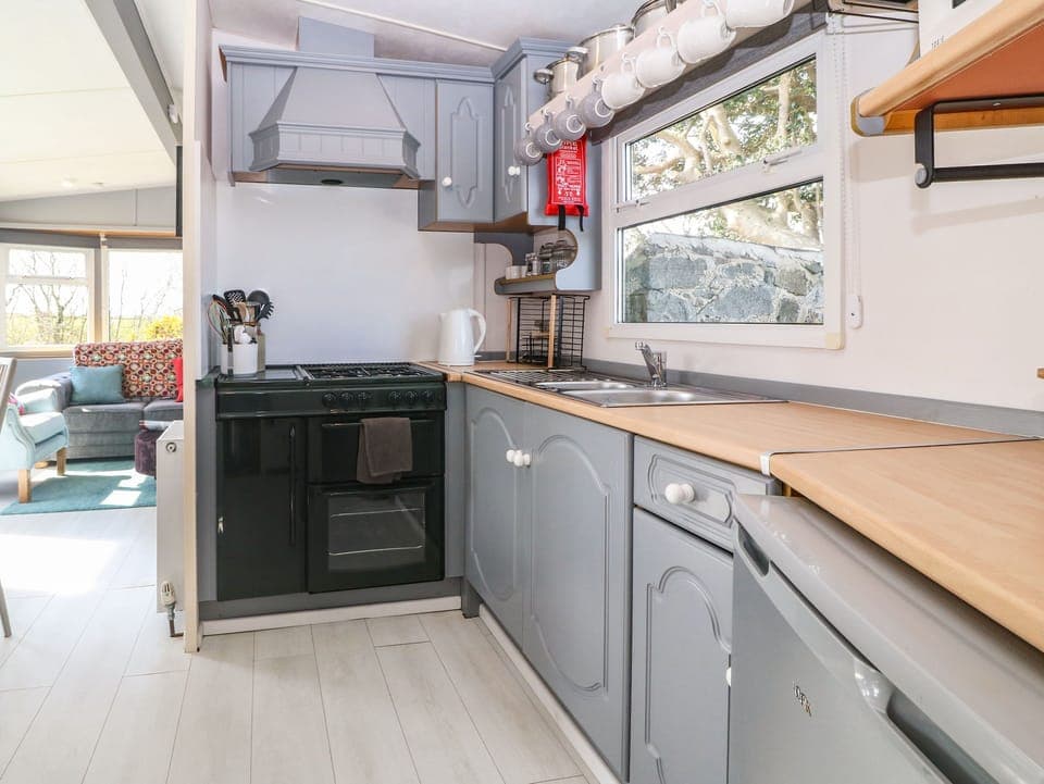 Fridge, electric kettle, toaster, cookware/dishes/utensils