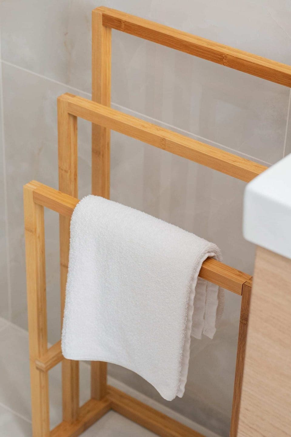 The bathroom's contemporary decor complements the apartment's style. 