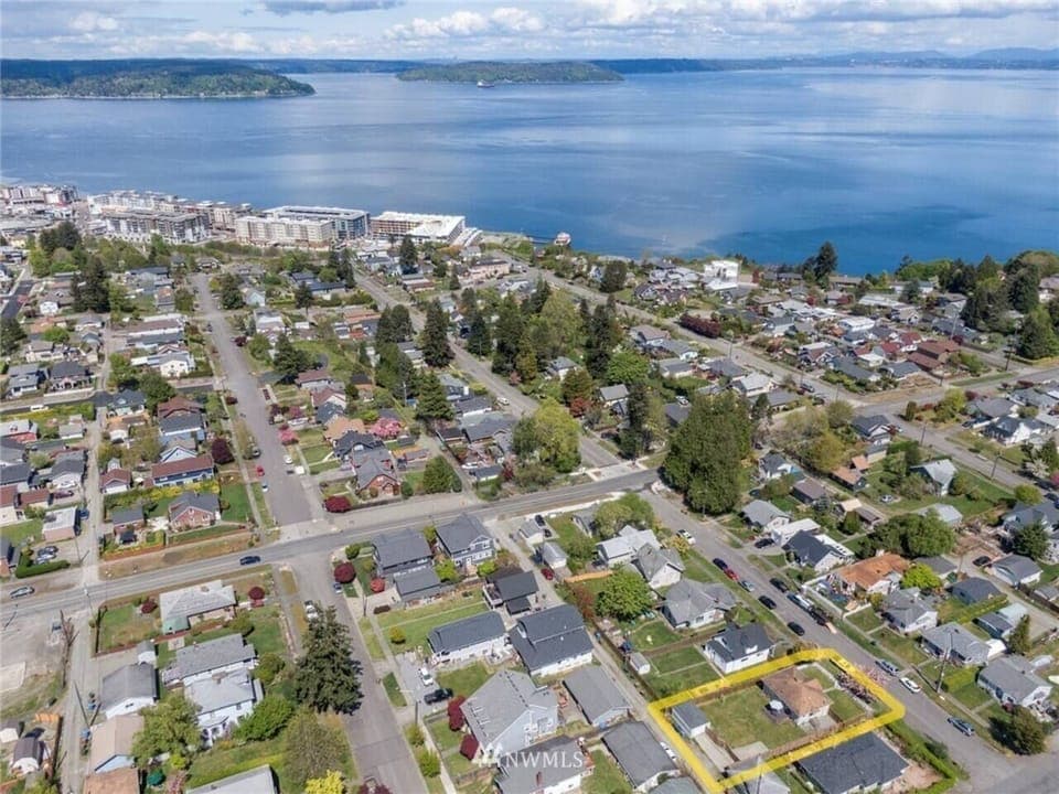 Head directly East down Ferdinand Street to end up at the waterfront, Ruston Way!