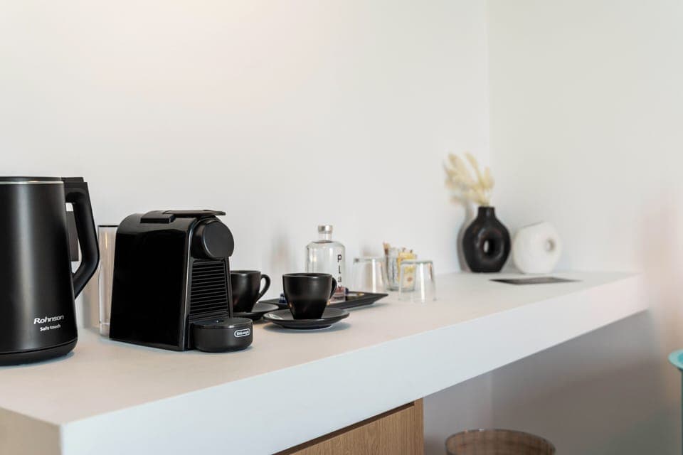 Standard Room, Pool View | Coffee and/or coffee maker