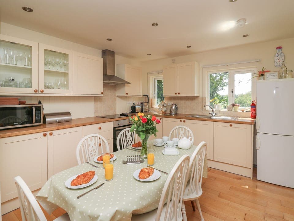 Fridge, electric kettle, toaster, cookware/dishes/utensils