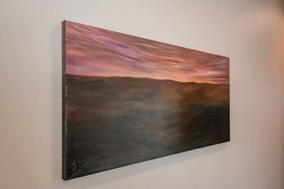 Enjoy original artwork that adds warmth and character to the room.