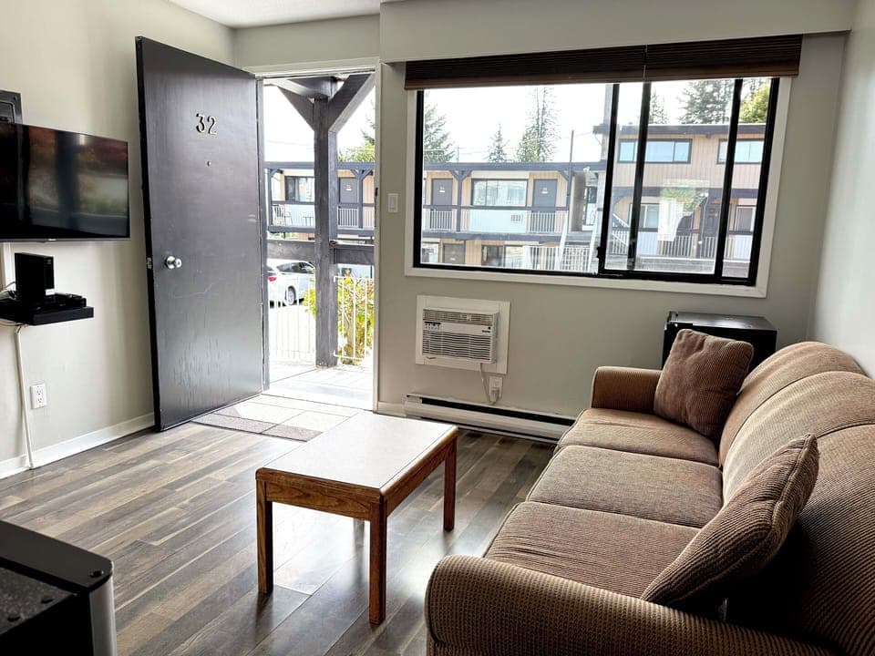 Room, 1 Queen Bed with Sofa bed, Kitchenette | Living area | LCD TV