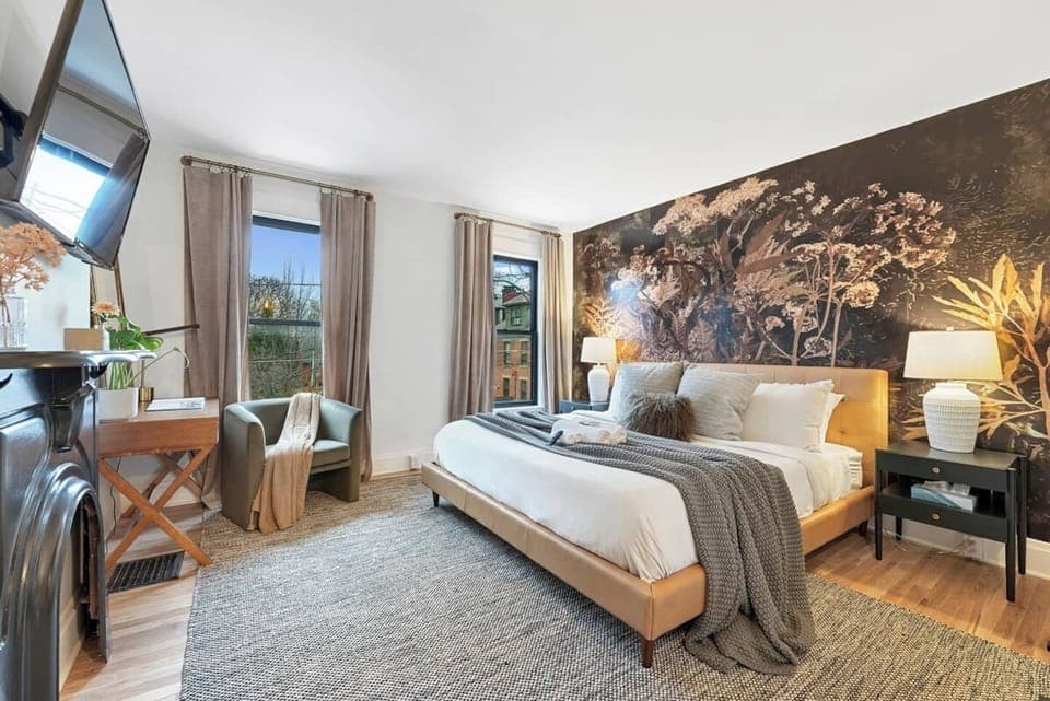 Comfortable king bed in primary suite. 